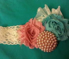 Mauve, teal and ivory with pearl button with lace accent